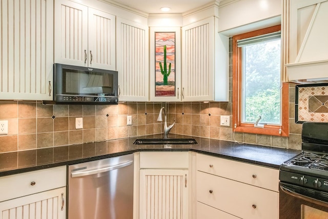 3 N Jackson Rd, Poughkeepsie, NY 12603 - kitchen with black appliances, backsplash, dark stone counters, and crown molding