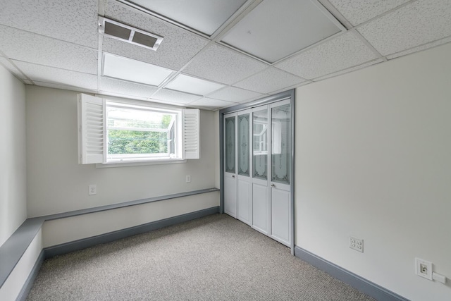 3 N Jackson Rd, Poughkeepsie, NY 12603 - spare room with a drop ceiling and carpet floors