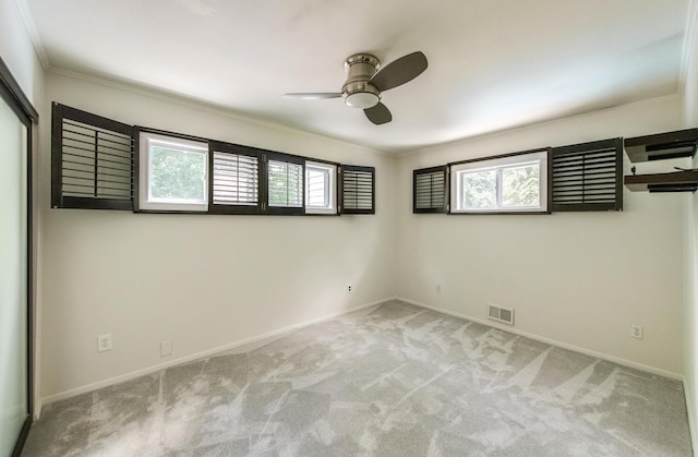 3 N Jackson Rd, Poughkeepsie, NY 12603 - spare room with ceiling fan, plenty of natural light, light colored carpet, and ornamental molding