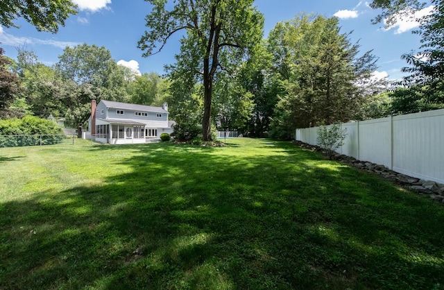 3 N Jackson Rd, Poughkeepsie, NY 12603 - fenced backyard featuring a sunroom