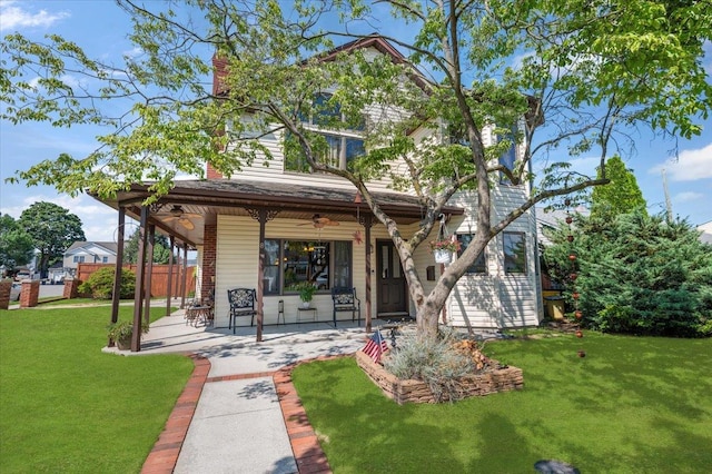 8 Pearl St, Bethpage, NY 11714 - view of front of house featuring ceiling fan, a patio, and a chimney