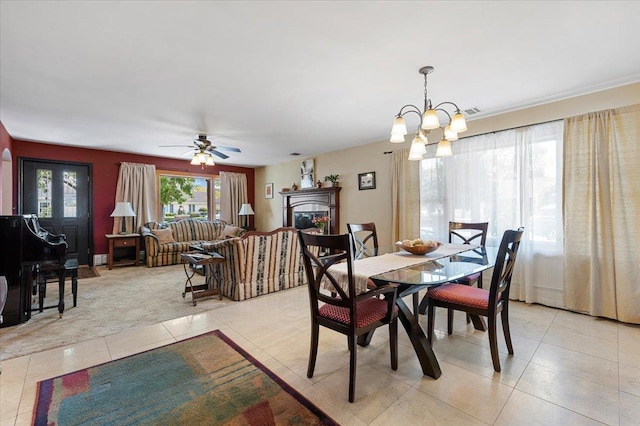 8 Pearl St, Bethpage, NY 11714 - dining room with a chandelier, light tile patterned floors, and ceiling fan
