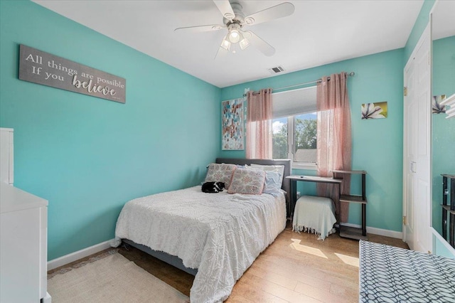 8 Pearl St, Bethpage, NY 11714 - bedroom with wood finished floors and a ceiling fan