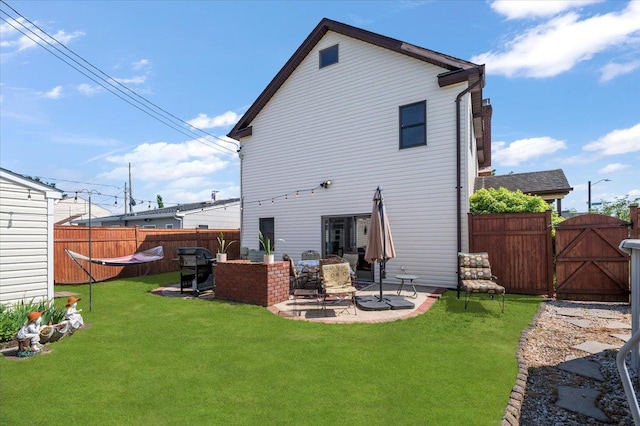 8 Pearl St, Bethpage, NY 11714 - back of property with a fenced backyard, a gate, and a patio