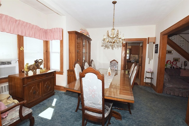 57 Nieman Ave, Lynbrook, NY 11563 - dining room featuring a chandelier and dark carpet
