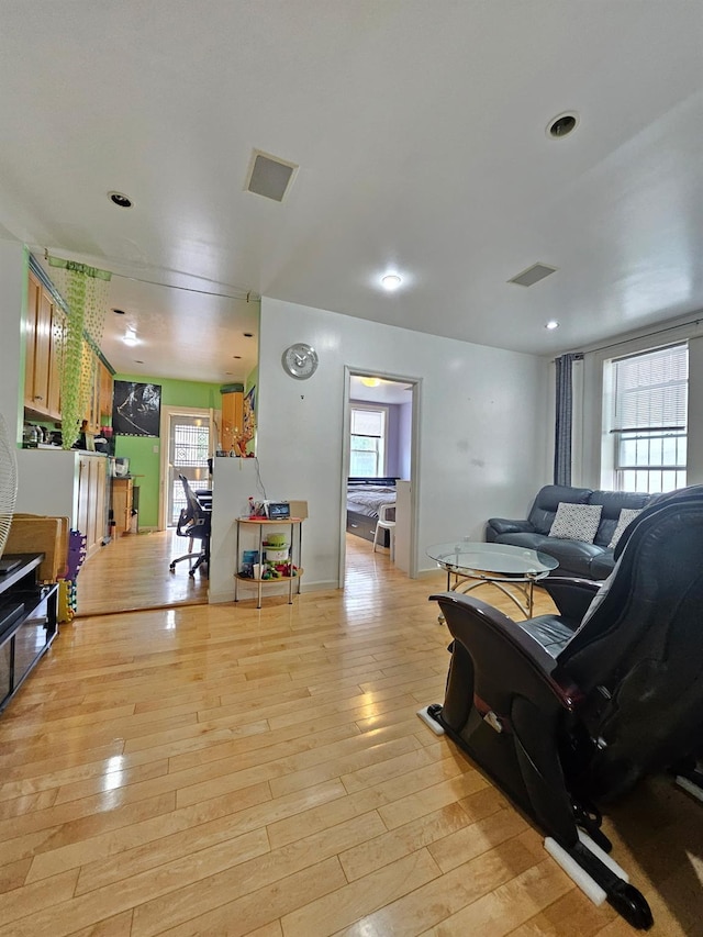 1714 W 12th St, Brooklyn, NY 11223 - living area featuring light wood-style flooring and recessed lighting