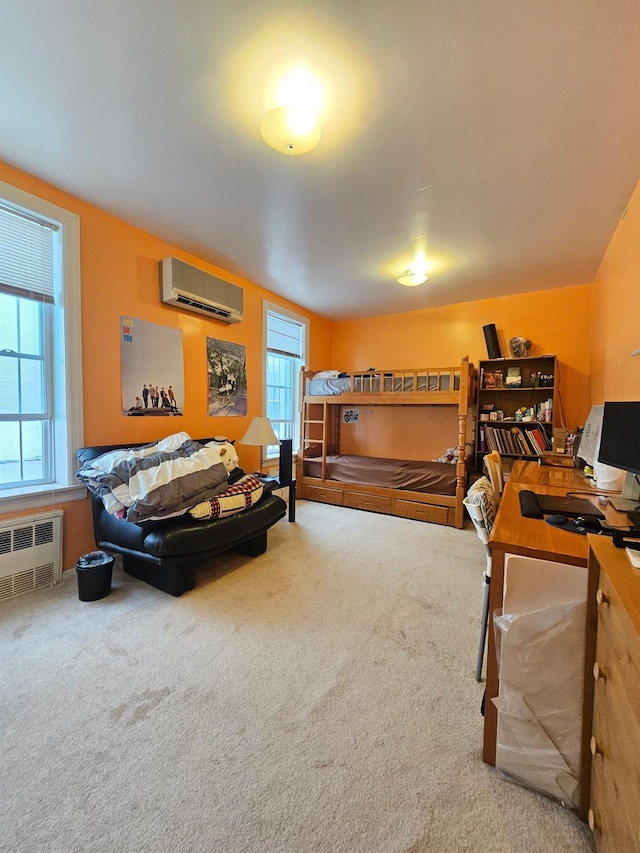 1714 W 12th St, Brooklyn, NY 11223 - bedroom featuring a wall mounted AC, carpet flooring, and radiator heating unit
