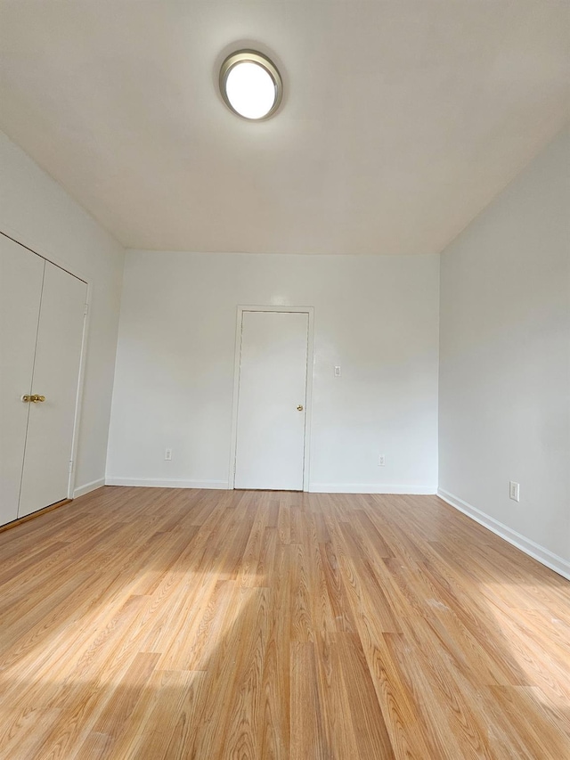 1714 W 12th St, Brooklyn, NY 11223 - spare room featuring light wood-type flooring and baseboards