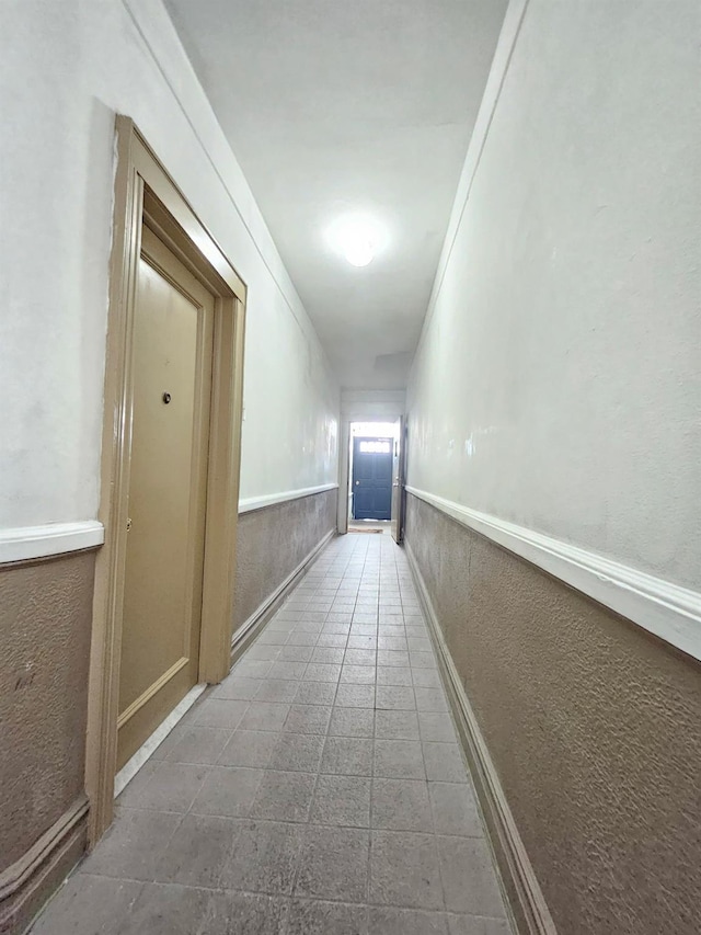 1714 W 12th St, Brooklyn, NY 11223 - hallway featuring tile patterned flooring