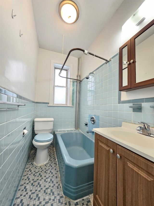 1714 W 12th St, Brooklyn, NY 11223 - full bathroom with tile walls, vanity, and shower / tub combination
