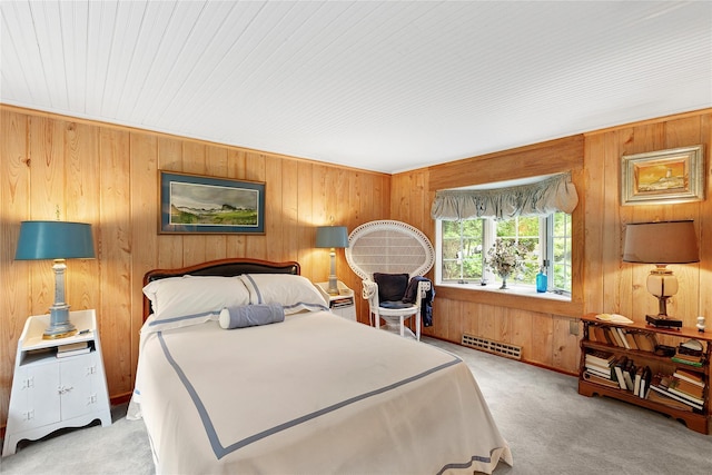 22 Turtle Cove Dr, Southampton, NY 11968 - bedroom with light carpet, wooden walls, and wood ceiling