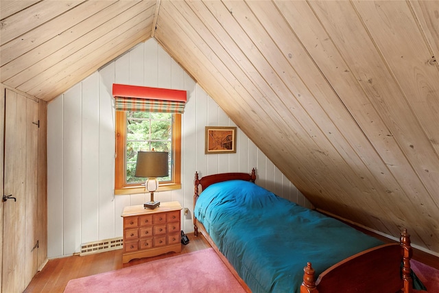 22 Turtle Cove Dr, Southampton, NY 11968 - bedroom with vaulted ceiling, wood finished floors, and wooden walls