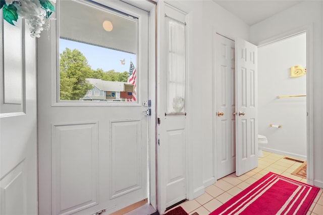 1105 Farmdale Rd, Brewster, NY 10509 - entrance foyer with light tile patterned floors