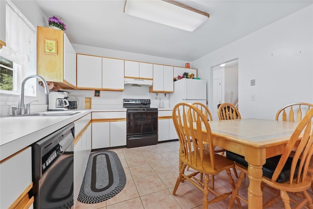 1105 Farmdale Rd, Brewster, NY 10509 - kitchen featuring black range with electric cooktop, dishwashing machine, under cabinet range hood, and white cabinets