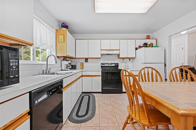 1105 Farmdale Rd, Brewster, NY 10509 - kitchen featuring black appliances, ventilation hood, white cabinets, and light countertops