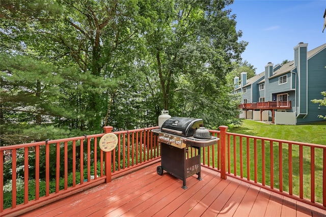 1105 Farmdale Rd, Brewster, NY 10509 - wooden terrace featuring area for grilling, a lawn, and a residential view