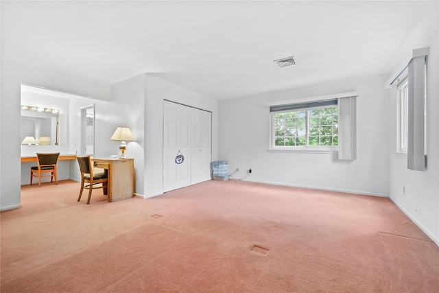 1105 Farmdale Rd, Brewster, NY 10509 - unfurnished bedroom with carpet, an office area, and a closet