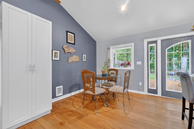 69 Floradan Rd, Putnam Valley, NY 10579 - dining room featuring vaulted ceiling and light wood-style flooring