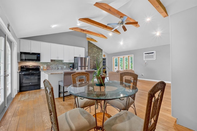 69 Floradan Rd, Putnam Valley, NY 10579 - dining area featuring light wood-type flooring, beamed ceiling, high vaulted ceiling, a wall unit AC, and ceiling fan