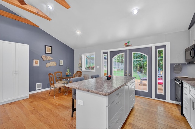 69 Floradan Rd, Putnam Valley, NY 10579 - kitchen featuring black appliances, french doors, plenty of natural light, light wood finished floors, and recessed lighting