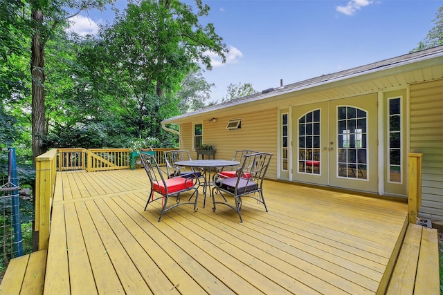 69 Floradan Rd, Putnam Valley, NY 10579 - wooden terrace with outdoor dining area and french doors