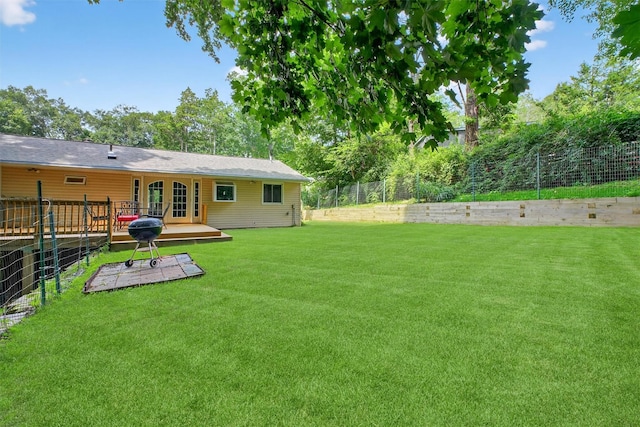 69 Floradan Rd, Putnam Valley, NY 10579 - fenced backyard featuring french doors and a deck