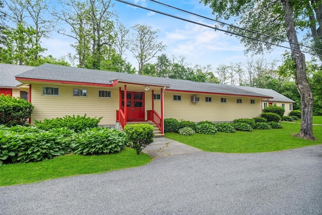 69 Floradan Rd, Putnam Valley, NY 10579 - ranch-style home featuring a front yard and roof with shingles