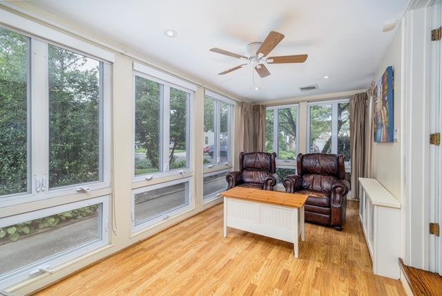 11 Loel Ct, Rockville Centre, NY 11570 - sunroom / solarium featuring wood finished floors and healthy amount of natural light