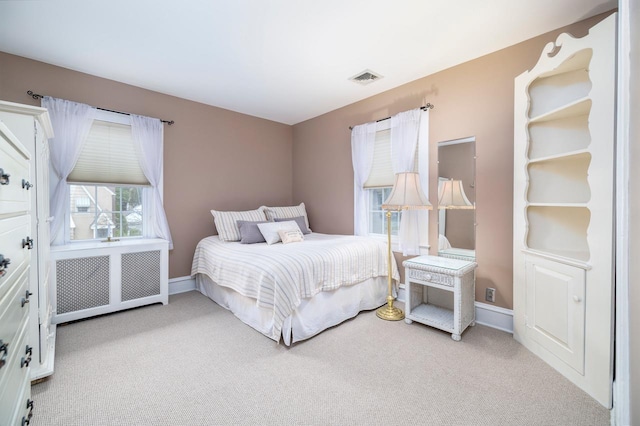 11 Loel Ct, Rockville Centre, NY 11570 - bedroom with radiator and light colored carpet