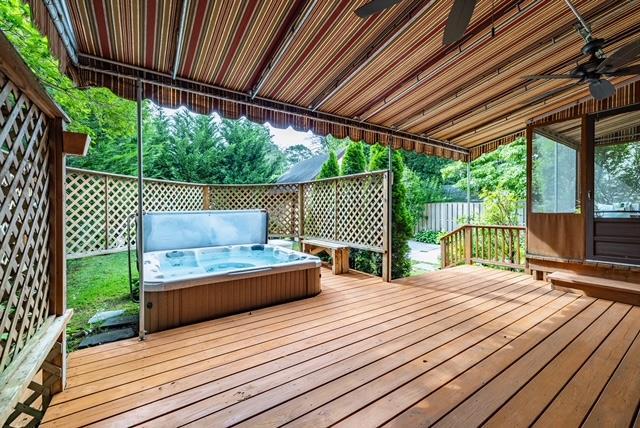11 Loel Ct, Rockville Centre, NY 11570 - deck featuring a hot tub and ceiling fan
