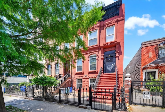 17 Palmetto St, Brooklyn, NY 11221 - view of front of property with a fenced front yard