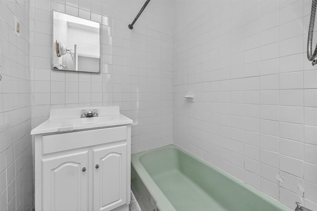 17 Palmetto St, Brooklyn, NY 11221 - bathroom with tile walls, vanity, and shower / tub combination