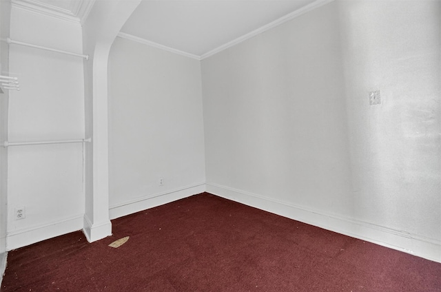 17 Palmetto St, Brooklyn, NY 11221 - unfurnished bedroom featuring carpet, arched walkways, and crown molding