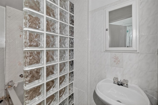 17 Palmetto St, Brooklyn, NY 11221 - bathroom featuring a tile shower, tile walls, and a tub to relax in