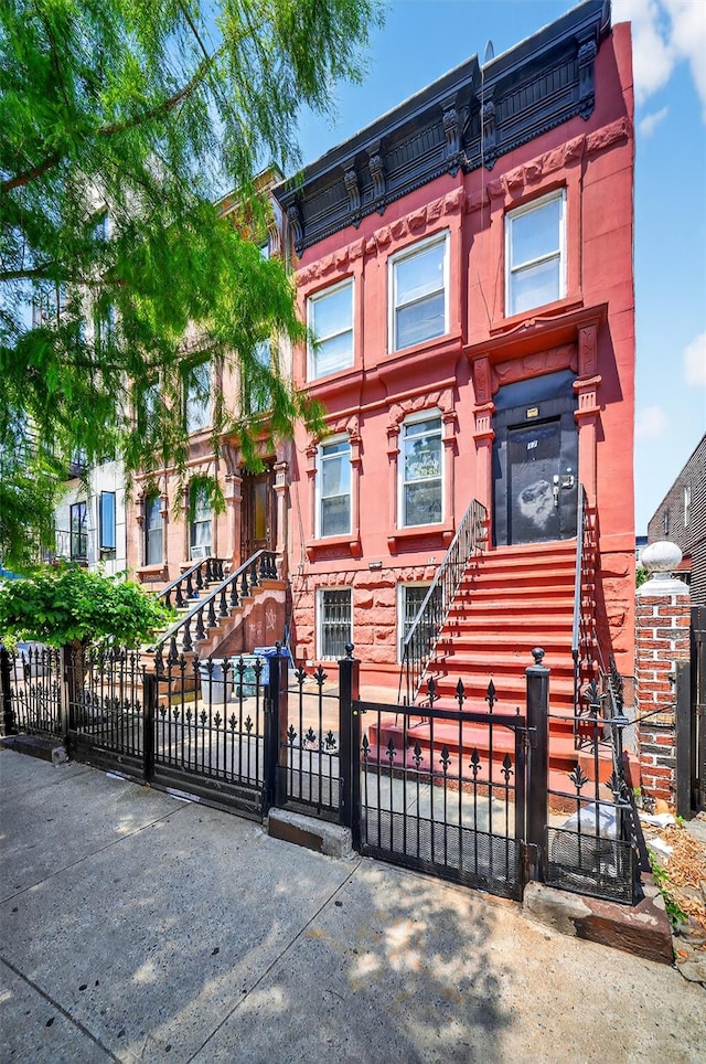 17 Palmetto St, Brooklyn, NY 11221 - italianate home featuring a fenced front yard and stairway