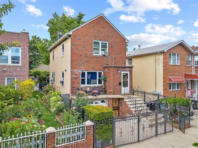 2719 Hering Ave, Bronx, NY 10469 - traditional-style home with brick siding and a fenced front yard