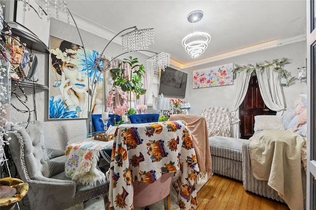 2719 Hering Ave, Bronx, NY 10469 - living area featuring a chandelier, wood finished floors, and crown molding