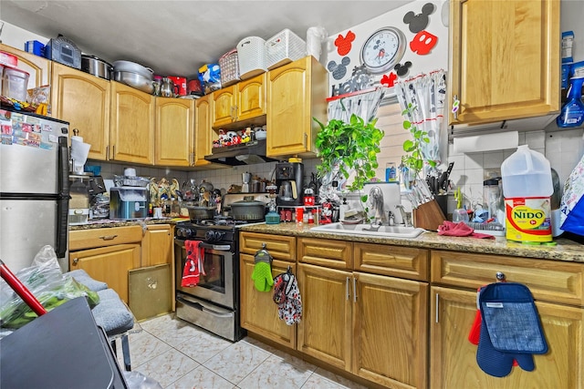 2719 Hering Ave, Bronx, NY 10469 - kitchen featuring appliances with stainless steel finishes, tasteful backsplash, range hood, and light countertops