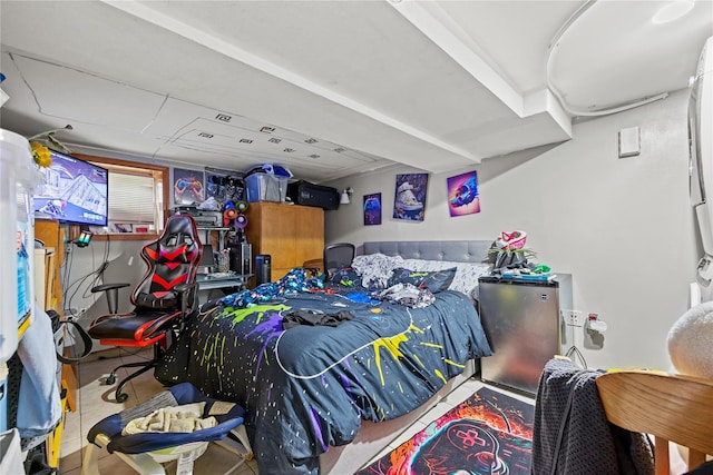 2719 Hering Ave, Bronx, NY 10469 - tiled bedroom featuring freestanding refrigerator
