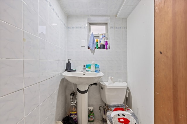 2719 Hering Ave, Bronx, NY 10469 - bathroom with toilet and tile walls