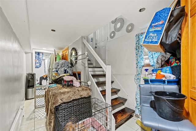 2719 Hering Ave, Bronx, NY 10469 - stairs featuring tile patterned floors, a baseboard heating unit, and recessed lighting