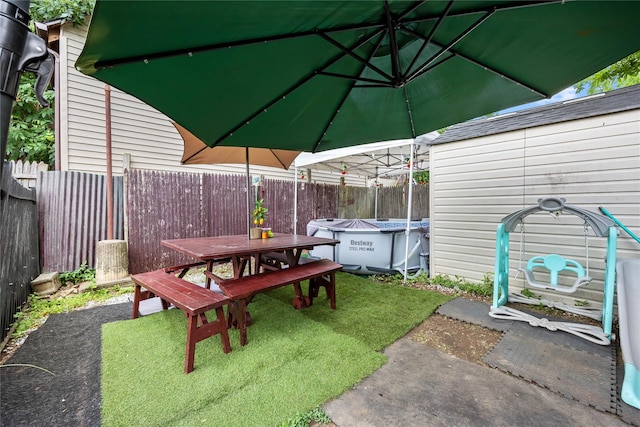 2719 Hering Ave, Bronx, NY 10469 - fenced backyard featuring outdoor dining space and a covered pool
