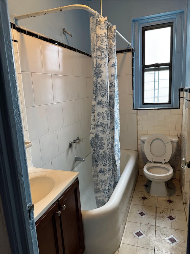 2922 Barnes Ave Unit 3A, Bronx, NY 10467 - bathroom with tile walls, shower / tub combo, tile patterned floors, and vanity