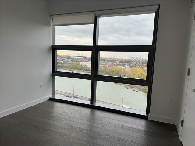 13101 40th Rd Unit 12M, Flushing, NY 11354 - empty room featuring dark wood-type flooring