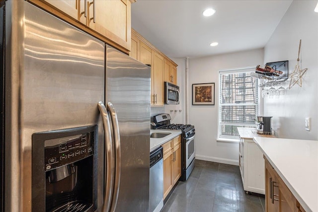 30-69 Hobart St Unit 2P, Woodside, NY 11377 - kitchen featuring stainless steel appliances, light brown cabinetry, light countertops, recessed lighting, and dark tile patterned floors