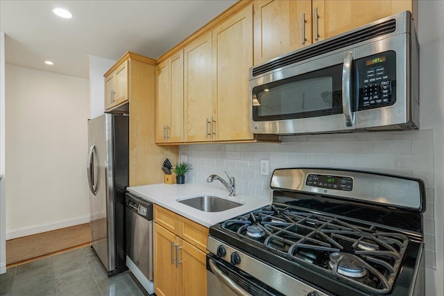 30-69 Hobart St Unit 2P, Woodside, NY 11377 - kitchen with stainless steel appliances, decorative backsplash, light countertops, light brown cabinetry, and recessed lighting