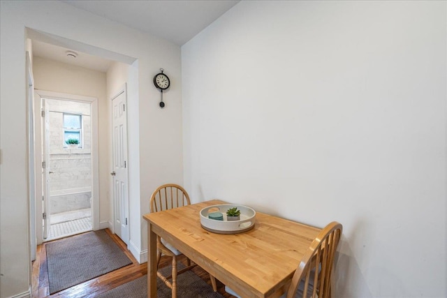 30-69 Hobart St Unit 2P, Woodside, NY 11377 - dining room featuring wood finished floors and baseboards