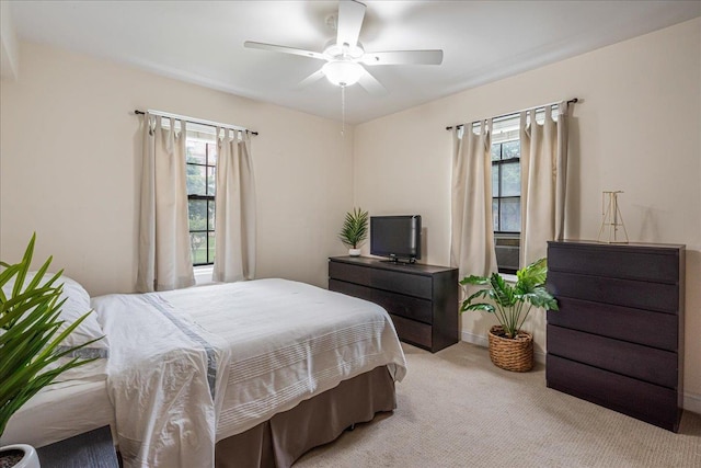 30-69 Hobart St Unit 2P, Woodside, NY 11377 - bedroom with multiple windows, light carpet, and ceiling fan