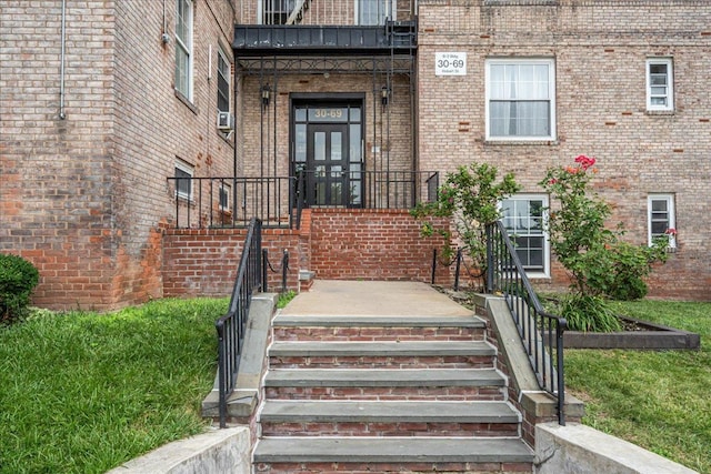 30-69 Hobart St Unit 2P, Woodside, NY 11377 - view of exterior entry featuring brick siding