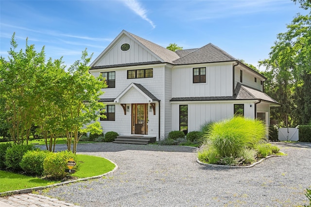 5 Kings Ln, Southampton, NY 11968 - view of front of house with a shingled roof and curved driveway